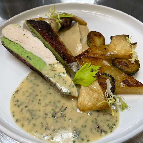 Roasted Heritage Chicken Breast with Herb and Black Trumpet Mousseline, Caramelized Cauliflower Puree, Confit Potato, Roasted Trumpet Mushroom, Brussel sprout, Truffle and Chive Sauce Supreme